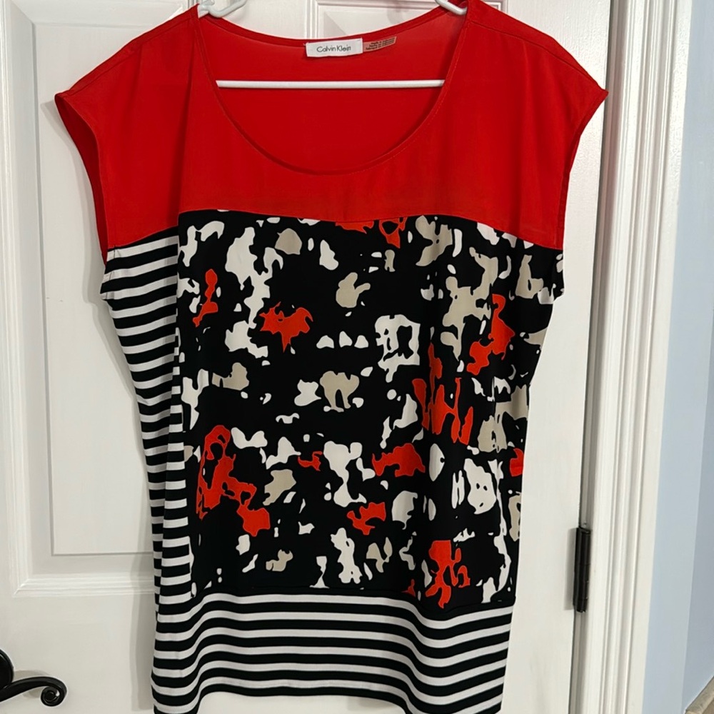 Calvin Klein mix design spandex sleeveless shirt.SZ L EUC no rips tearsorstains